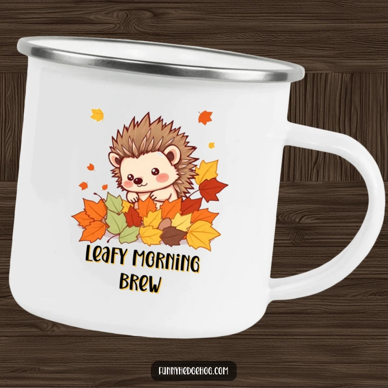 Funny Hedgehog Camping Mug: Spiky kawaii hedgehog peeking from autumn leaves, designed for cozy outdoor sips and humorous campfire tales.
