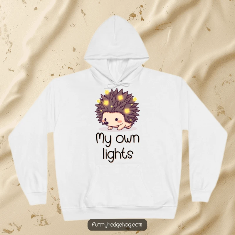 Funny hoodie depicting a hedgehog whose spikes are adorned with tiny, luminous fireflies, perfect for magical cozy evenings.